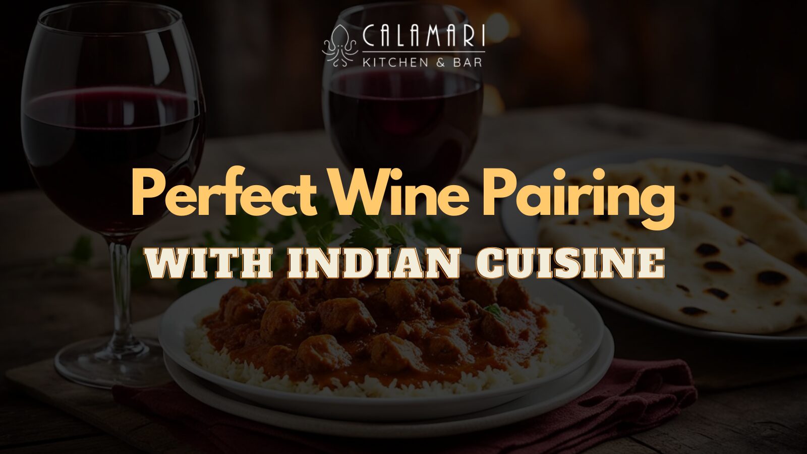 A glass of red wine beautifully paired with Indian curries, showcasing ideal wine pairings for Indian cuisine as described in the Calamari Kitchen & Bar blog.