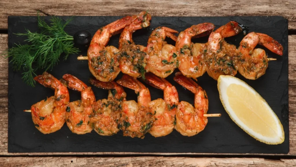 Juicy Prawn Tikka skewers marinated in Indian spices, grilled to perfection, served at Calamari Kitchen & Bar, Newcastle.